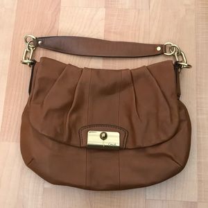 Authentic tan/brown single flap Coach handbag